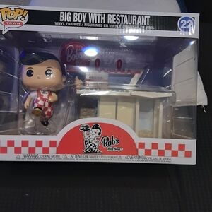 The product is a Funko POP! vinyl figure from the Town collection,